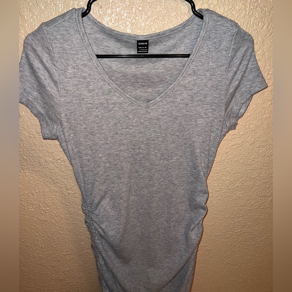 Bodycon gray ribbed dress with ties on the sides